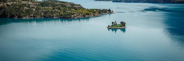 the-chapel-of-st-michael-set-in-the-middle-of-the-lake-of-serre-poncon-valentin-pacaut-the-explorers.jpg