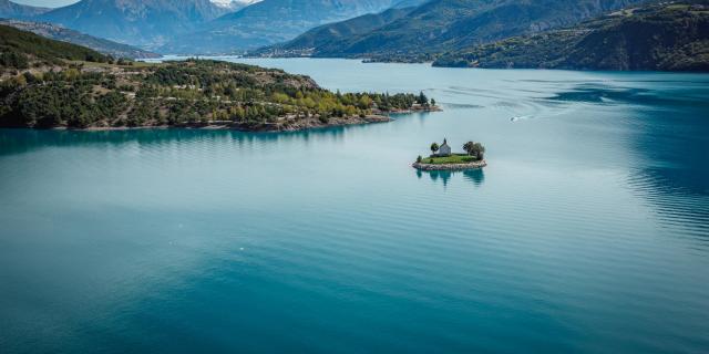 the-chapel-of-st-michael-set-in-the-middle-of-the-lake-of-serre-poncon-valentin-pacaut-the-explorers.jpg