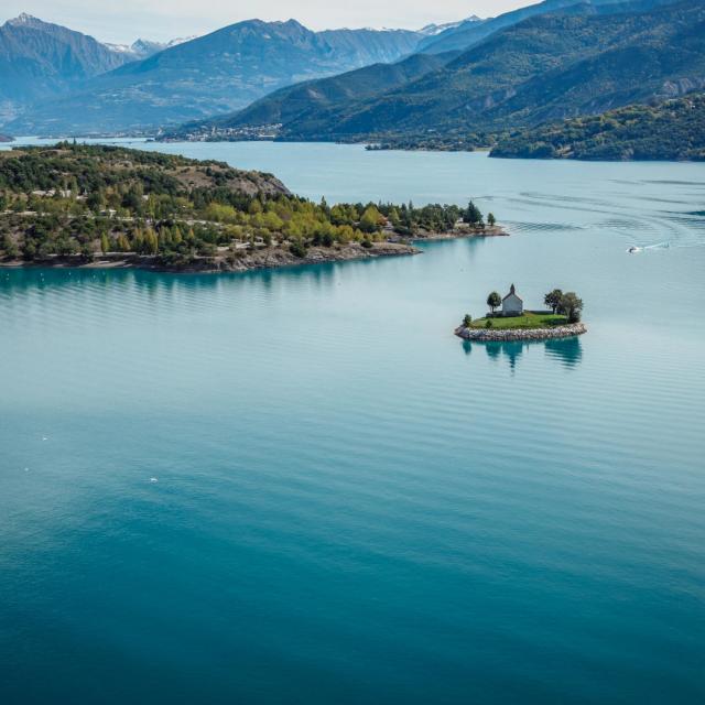 The Chapel Of St. Michael, set in the middle of the lake of Serre-Ponçon