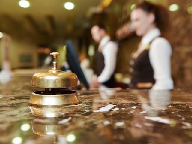 Modern luxury hotel reception counter desk with bell