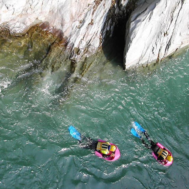 two men hydrospeeding in Sesia river in Italy