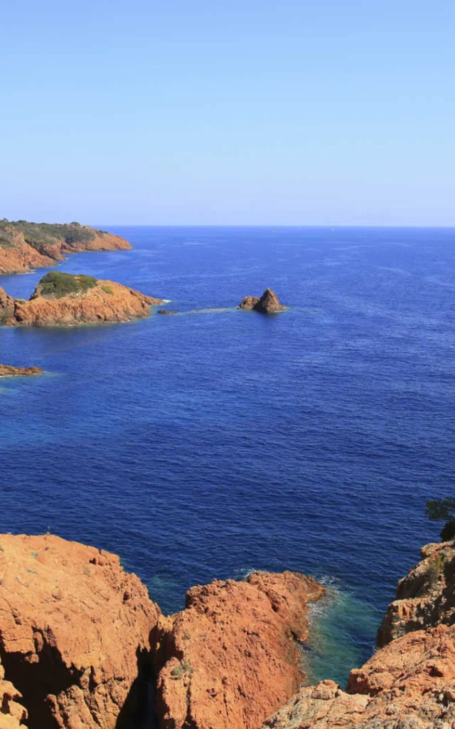 Esterel mediterranean red rocks coast, beach and sea. French Riviera in Cote d Azur near Cannes Saint Raphael, Provence, France, Europe