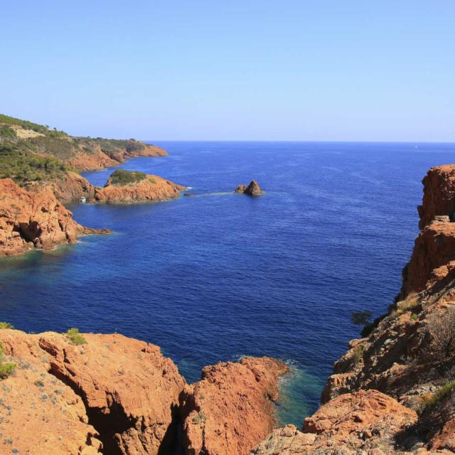 Esterel mediterranean red rocks coast, beach and sea. French Riviera in Cote d Azur near Cannes Saint Raphael, Provence, France, Europe