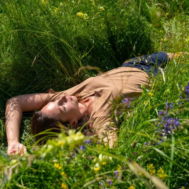 Woman lying in the grass - Boscodon Abbey