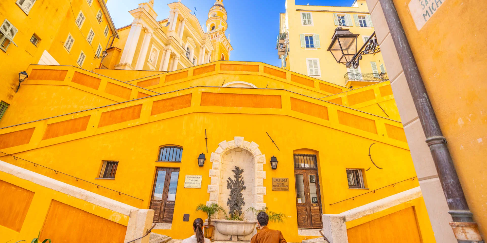 Couple out for a stroll on the ramps of Saint-Michel in Menton