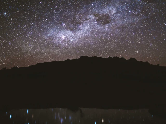 Massif and starry skies