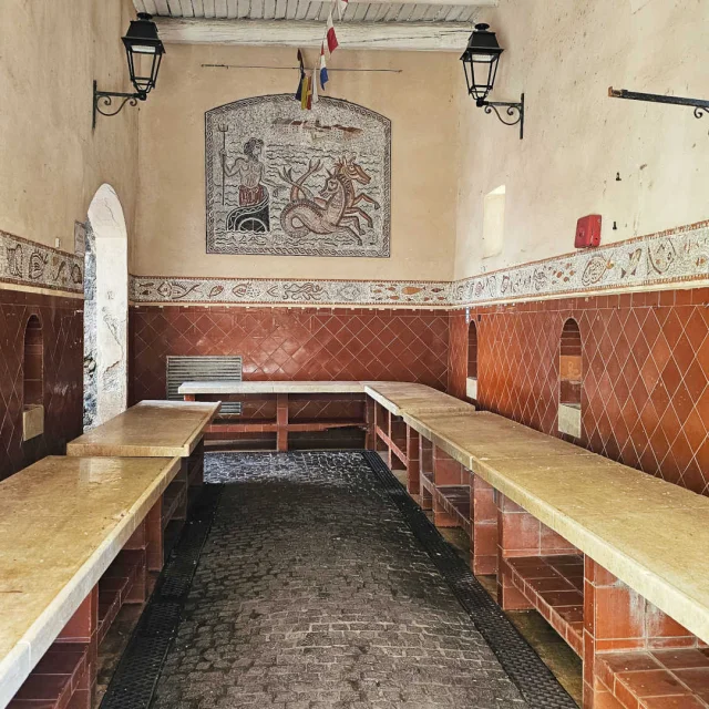 Mosaics and marble stalls at the Fish Market in Saint Tropez